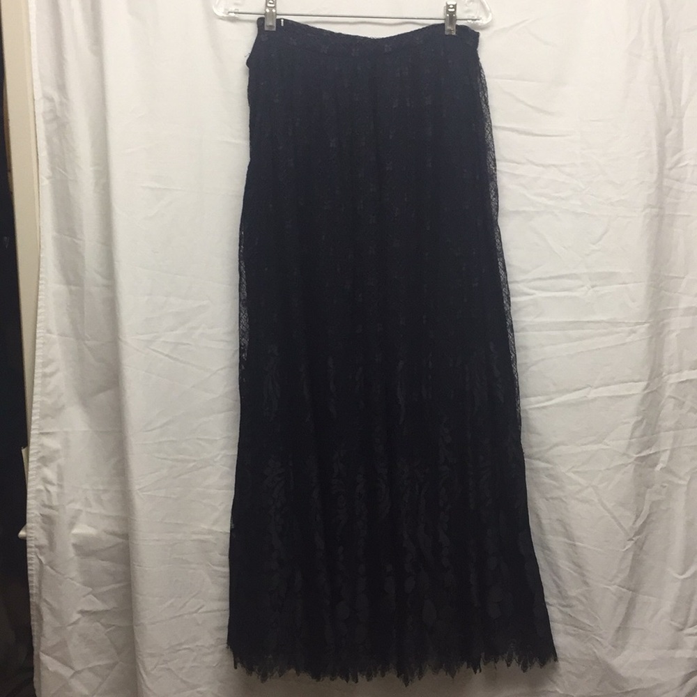 Navy soft lace maxi lined skirt 37” long.
